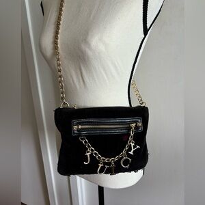 Juicy Couture black suede crossbody purse with gold chain.
